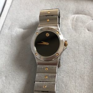 Woman’s movado watch *(price is firm)*